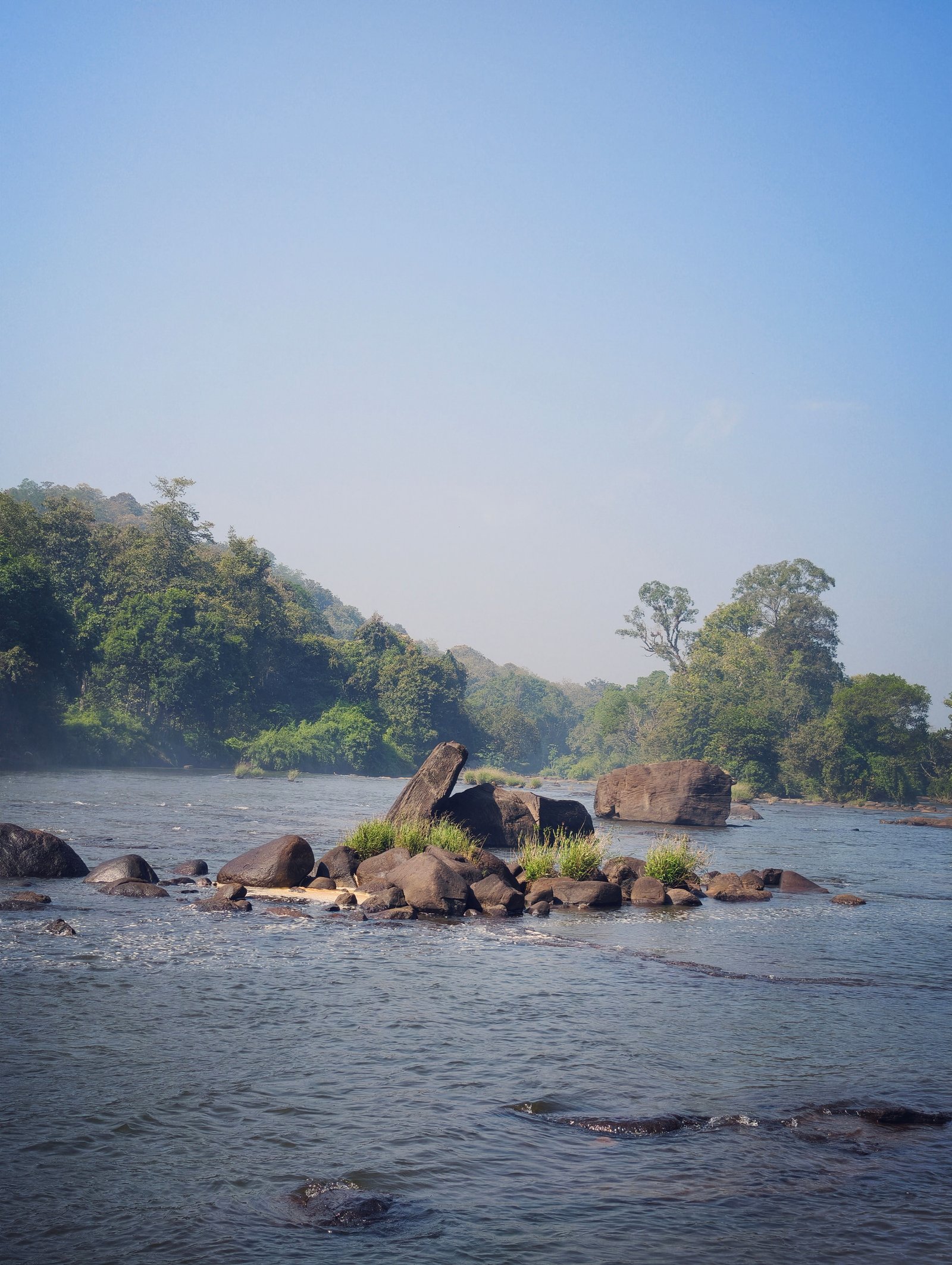 Cochin Airport → Athirappilly Waterfalls → Munnar